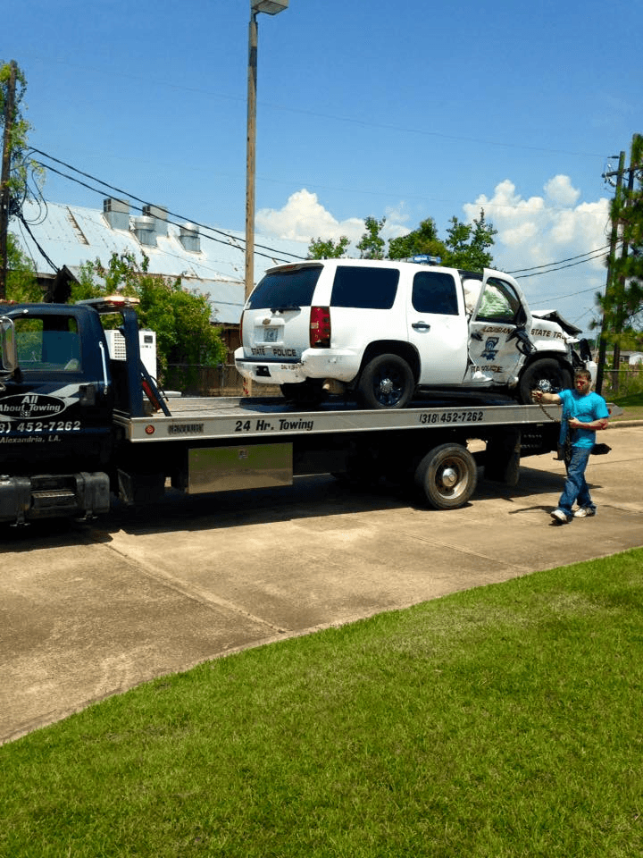 All About Towing assisting at an accident scene with law enforcement